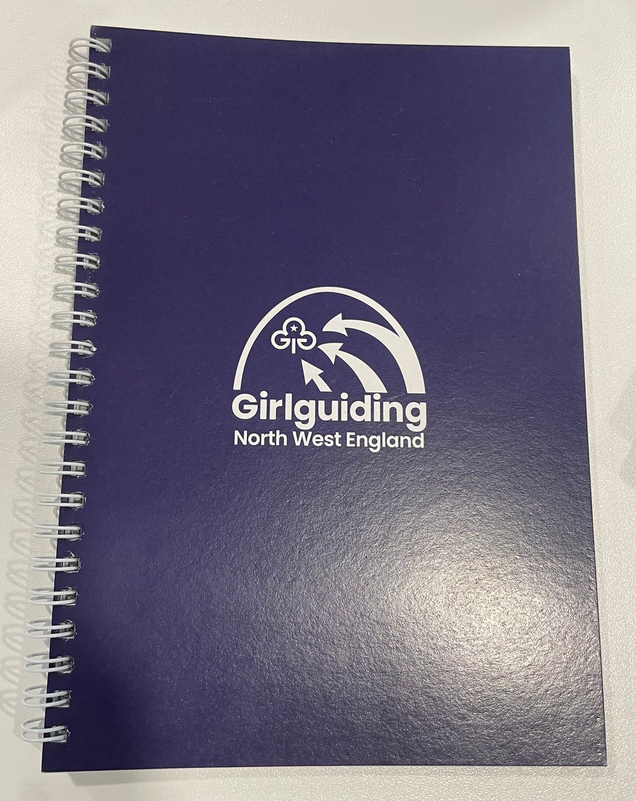Lined region logo notebook